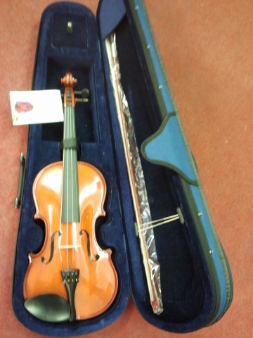 Violin with case.